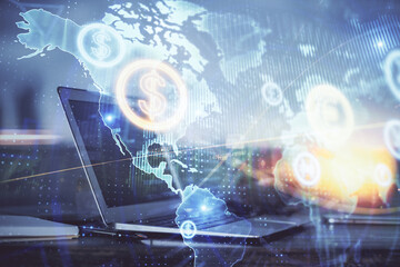 Stock market graph on background with desk and personal computer. Double exposure. Concept of financial analysis.