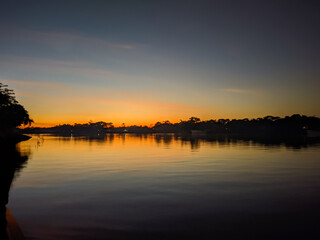 Fototapeta na wymiar Sunset view on the Lakeside