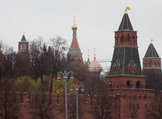 Moscow, Russia, The Kremlin. Some towers (south and east). St. Basil's cathedral in background