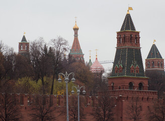 Fototapeta premium Moscow, Russia, The Kremlin. Some towers (south and east). St. Basil's cathedral in background