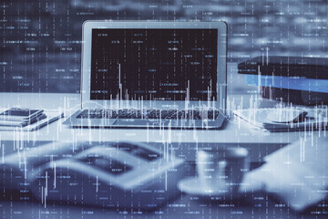 Financial graph colorful drawing and table with computer on background. Double exposure. Concept of...