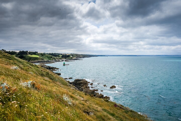 Obraz premium Lighthouse and coast landscape in Brittany, France