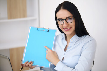 Smile business woman shows fingers. Long hair model