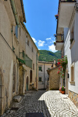 A narrow street among the old houses of Civitella Alfedena, a medieval village in the Abruzzo region, Italy.