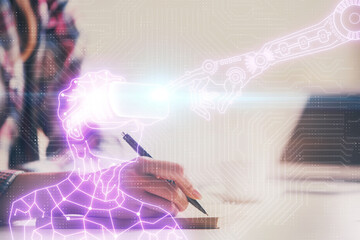 Cryptocurrency hologram over woman's hands writing background. Concept of blockchain. Multi exposure
