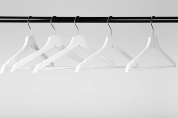 slider black fashion coat rack with empty white hangers