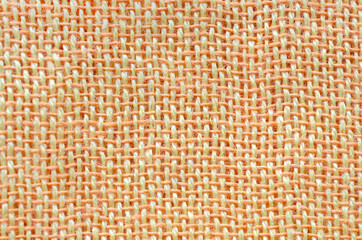 Top view of cotton woven or textile texture in soft brown tone