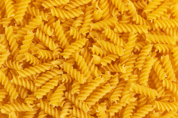 Italian pasta fusilli. Top view. Full Frame photo.