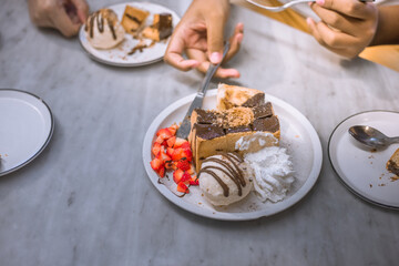 Blurred background view Of the dessert menu (Honey Toast) that contains ice cream, whipped cream, sour fruit like strawberries to be decorated and served to the customer.