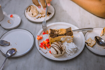 Blurred background view Of the dessert menu (Honey Toast) that contains ice cream, whipped cream, sour fruit like strawberries to be decorated and served to the customer.