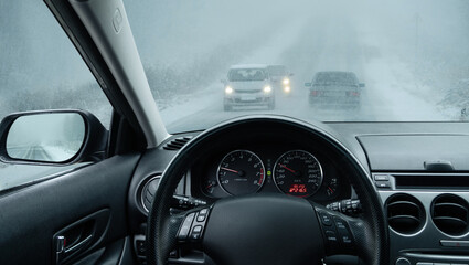 The car is driven on a winter road	