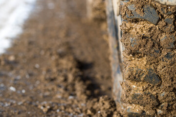 Extreme off road tire on 4wd vehicle close up, space for text.
