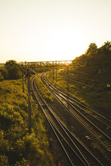 railroad tracks in the sunset