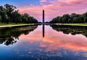 Fototapeta na wymiar Washington Monument on the Reflecting Pool in Washington, DC, USA at dawn.