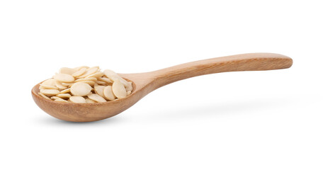watermelon seed in wood spoon isolated on white background