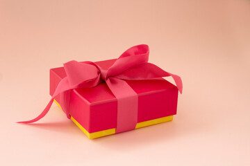 Pink gift with pink ribbon. Gift love concept.