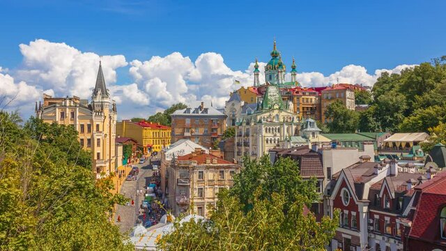 Kyiv old city architecture, Andrew&rsquo;s Descent with St. Andrew&rsquo;s Church in Ukraine. White clouds motions on blue sky, 4k time lapse
