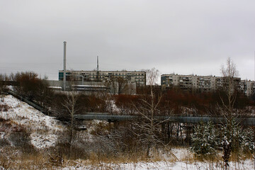 Obraz premium residential buildings and a boiler house on the outskirts of the city