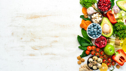 Food map: vegetables, fruits, fish, meat, nuts and other foods. Top view. Free copy space.