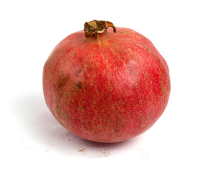 whole pomegranate on white background