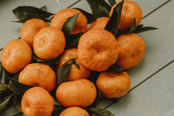 Christmas tangerines on a light tray on top 