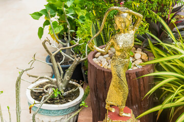 The golden statue of the goddess in the garden
