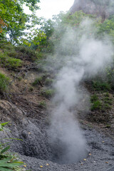 Steam coming out of the ground in the "Hell Valley", hot spring resort of Noboribets