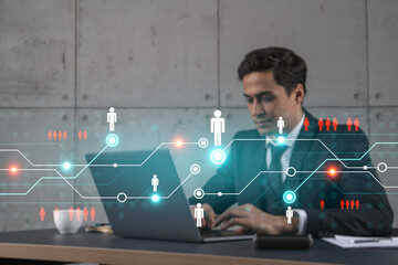 Businessman in office working with laptop, develop networking chain to push new social media project, typing computer. Double exposure. - Powered by Adobe