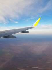 Wing aircraft in the blue sky