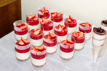 Panna cotta with strawberry jelly, Italian dessert, home cooking.