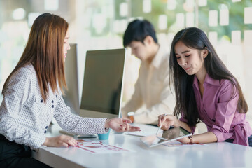 Young business team working with business report document on office desk. Brainstorming Business People Design Planning, Brainstorming Planning Partnership.	