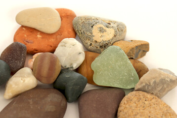 
natural sea stones on yellow background
