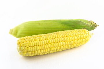 Fresh corn cob isolated on white background.