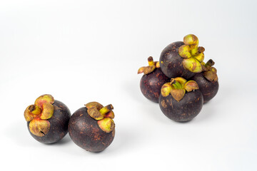 Mangosteens isolated on white background, Mangosteens the Queen of fruits.
