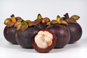 Mangosteens isolated on white background, Mangosteens the Queen of fruits.
