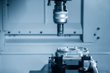 The CNC milling machine rough cutting  the aluminum casting  parts by indexable  endmill tools. The automotive parts manufacturing process by machining center.