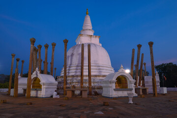 Evening twilight at the ancient stupa Thuparama Dagoba. Anuradhapura, Sri Lanka