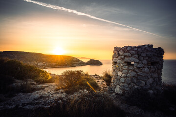 Coastal tower Autumnal Sunrise at Cala Mosca in Cagliari Sardinia