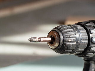 close-up of part of an electric screwdriver. Construction tools