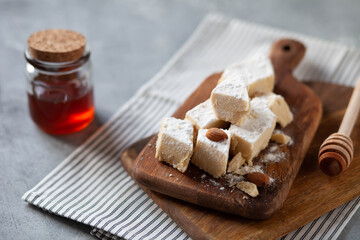 Oriental sweets on a wooden cutten board