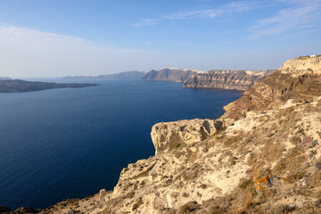 The coast of Santorini Island in Greece, impressive volcanic cliffs and a view of the caldera. Cyclades Islands