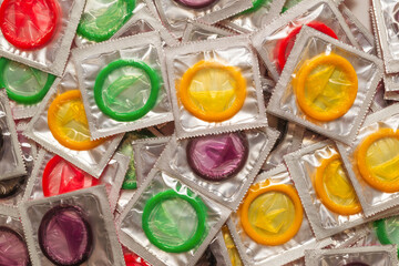 Colorful condoms background.