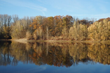 tranquil landscape at a lake in autumn