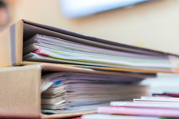 File document orange binders for accountant audit in bookkeeping business office. Archive auditing or financial in corporate concept