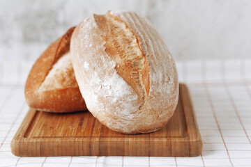 Fresh homemade crisp bread, soft focus. French bread. Bread at leaven. Unleavened bread.