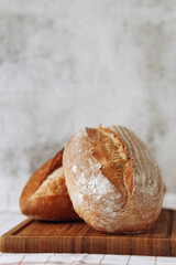 Fresh homemade crisp bread, soft focus. French bread. Bread at leaven. Unleavened bread.