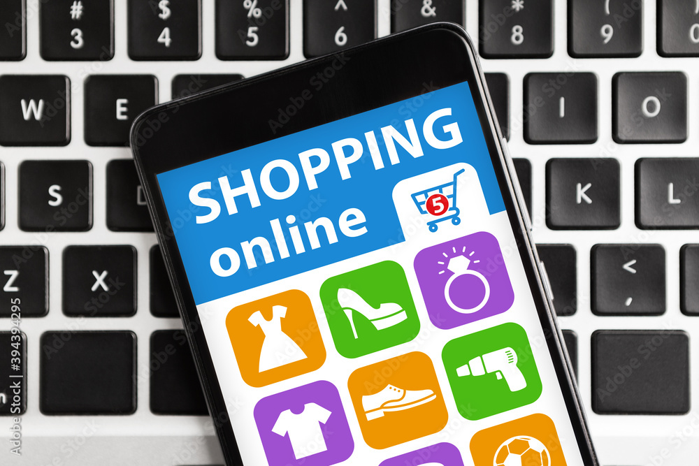 Poster Smartphone With Application For Online Shopping Lying On Computer Keyboard