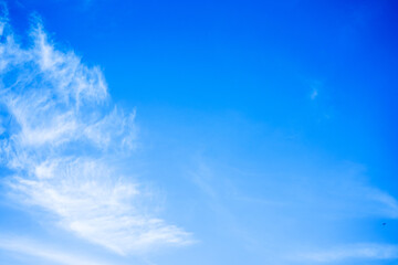 Natural of White clouds on blue sky with copy space for banner or wallpaper background. freedom concept