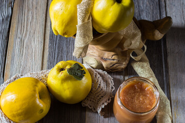 Quince on wooden background. Selective focus.