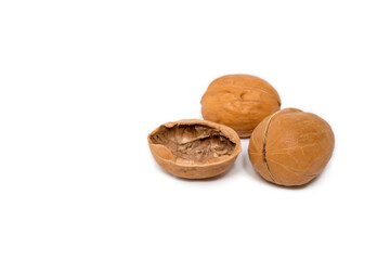 Kernel and whole walnut isolated on white background. high in protein, healthy fats, omega-3 and omega-6 fatty acids, B vitamins, zinc
